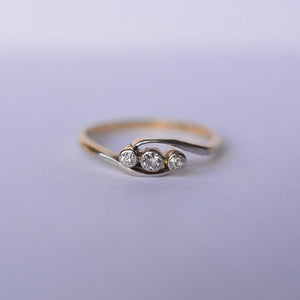 Edwardian 18ct gold diamond twist trilogy ring