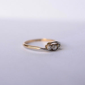 Edwardian 18ct gold diamond twist trilogy ring