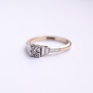 Geometric mid century diamond solitaire engagement ring